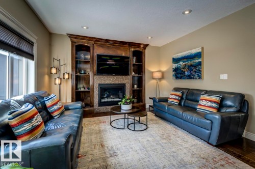 1005 Downey Way, Edmonton, AB - Indoor Photo Showing Living Room With Fireplace