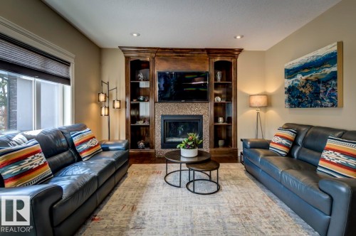1005 Downey Way, Edmonton, AB - Indoor Photo Showing Living Room With Fireplace