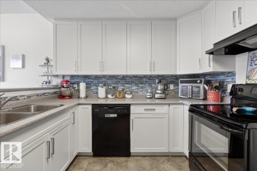 17 1179 Summerside Drive, Edmonton, AB - Indoor Photo Showing Kitchen With Double Sink