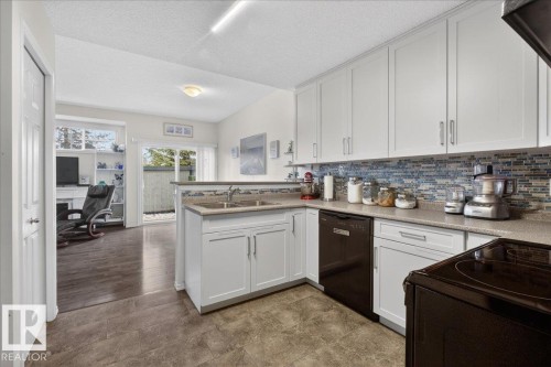 17 1179 Summerside Drive, Edmonton, AB - Indoor Photo Showing Kitchen With Double Sink