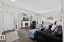 17 1179 Summerside Drive, Edmonton, AB  - Indoor Photo Showing Living Room With Fireplace 
