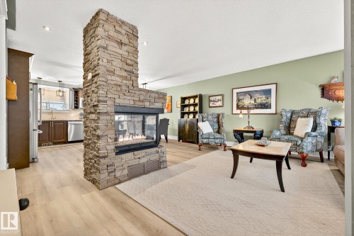 4664 16A Avenue, Edmonton, AB - Indoor Photo Showing Living Room With Fireplace