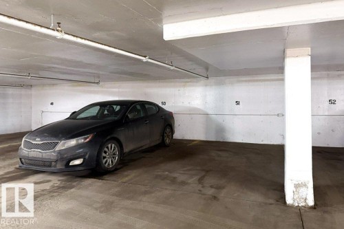 1007 9028 Jasper Avenue, Edmonton, AB - Indoor Photo Showing Garage
