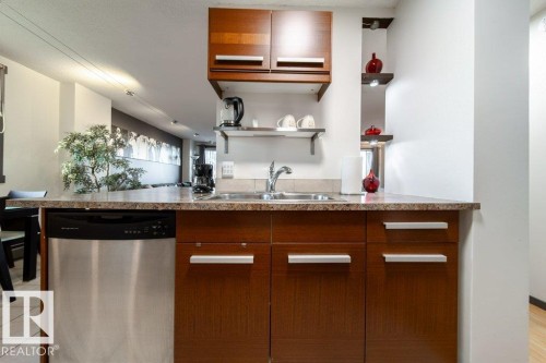1007 9028 Jasper Avenue, Edmonton, AB - Indoor Photo Showing Kitchen With Double Sink