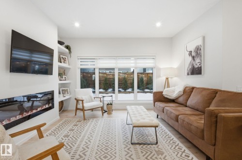 48 Riverhill Crescent, St. Albert, AB - Indoor Photo Showing Living Room With Fireplace
