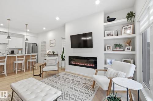 48 Riverhill Crescent, St. Albert, AB - Indoor Photo Showing Living Room With Fireplace