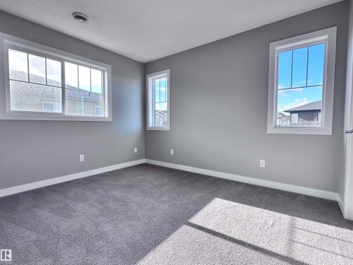 10 1530 Tamarack Boulevard, Edmonton, AB - Indoor Photo Showing Other Room