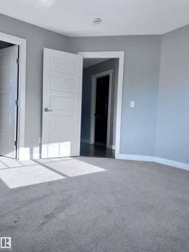 10 1530 Tamarack Boulevard, Edmonton, AB - Indoor Photo Showing Other Room
