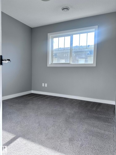 10 1530 Tamarack Boulevard, Edmonton, AB - Indoor Photo Showing Other Room