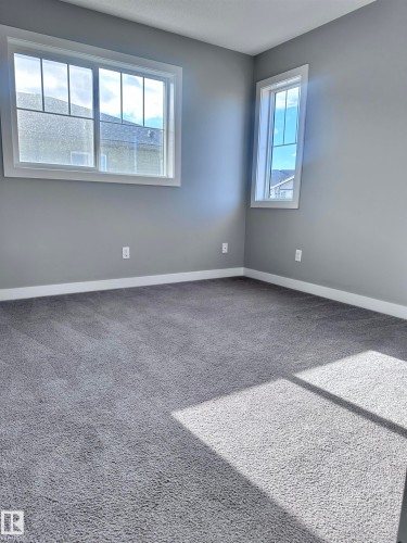 10 1530 Tamarack Boulevard, Edmonton, AB - Indoor Photo Showing Other Room