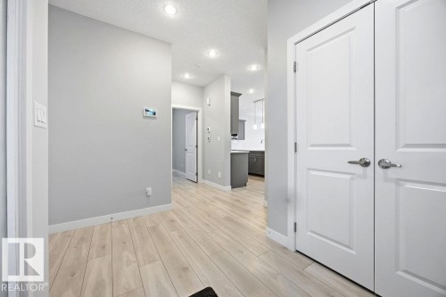 1057 Coopers Hawk Link, Edmonton, AB - Indoor Photo Showing Other Room