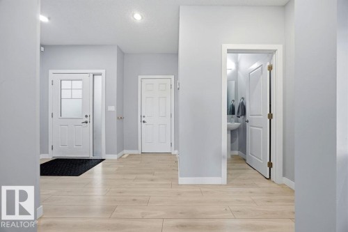 1057 Coopers Hawk Link, Edmonton, AB - Indoor Photo Showing Other Room