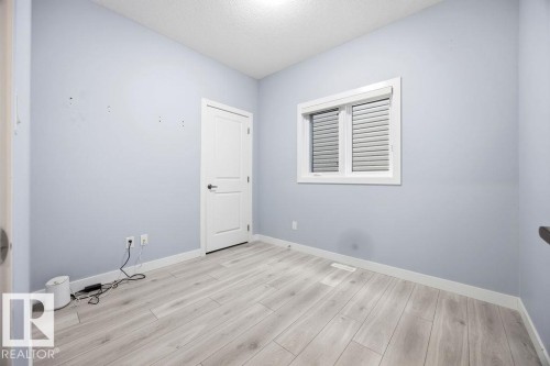 1057 Coopers Hawk Link, Edmonton, AB - Indoor Photo Showing Other Room