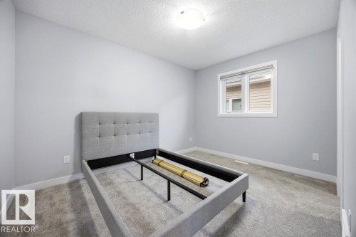 1057 Coopers Hawk Link, Edmonton, AB - Indoor Photo Showing Other Room