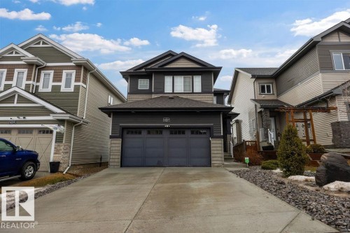 1057 Coopers Hawk Link, Edmonton, AB - Outdoor With Facade