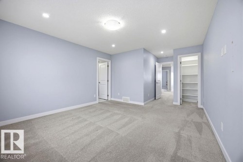 1057 Coopers Hawk Link, Edmonton, AB - Indoor Photo Showing Other Room
