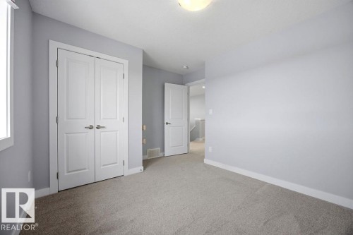 1057 Coopers Hawk Link, Edmonton, AB - Indoor Photo Showing Other Room