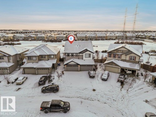 This property features a two-story design with a double-car garage - 1912 27 Street Nw, Edmonton, AB - Outdoor