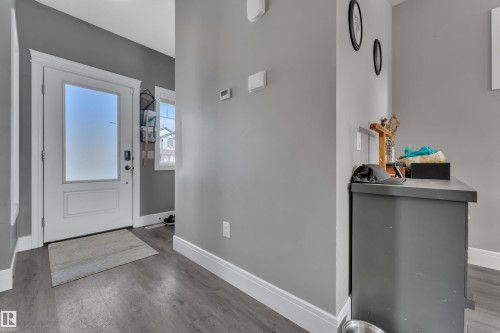 Entryway featuring gray walls, white trim, and light gray flooring - 195 Kirpatrick Way, Leduc, AB - Indoor Photo Showing Other Room