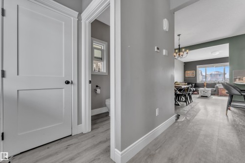 The property features durable flooring and a neutral color palette - 195 Kirpatrick Way, Leduc, AB - Indoor Photo Showing Other Room
