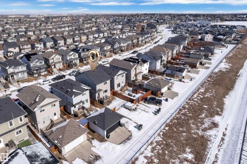 Aerial view showcasing the property within a residential neighborhood featuring detached homes - 195 Kirpatrick Way, Leduc, AB - Outdoor With View