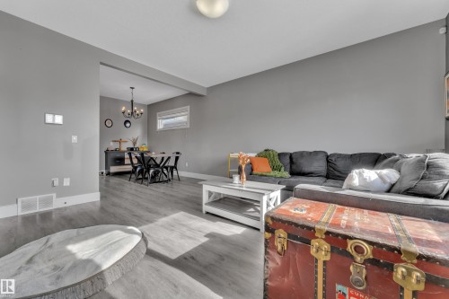The living area features light-toned flooring and neutral colored walls, creating a bright and inviting atmosphere - 195 Kirpatrick Way, Leduc, AB - Indoor Photo Showing Living Room