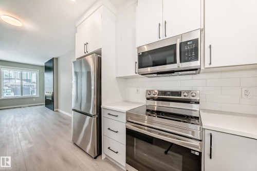 3323 Roy Brown Way, Edmonton, AB - Indoor Photo Showing Kitchen With Stainless Steel Kitchen