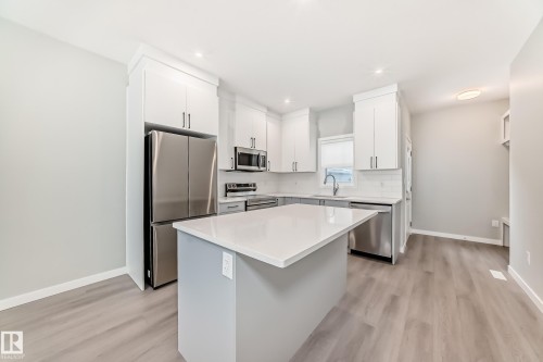 3323 Roy Brown Way, Edmonton, AB - Indoor Photo Showing Kitchen With Stainless Steel Kitchen With Upgraded Kitchen