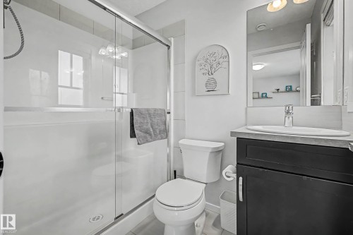 Bathroom with vanity and a stall shower - 4110 Allan Crescent, Edmonton, AB - Indoor Photo Showing Bathroom