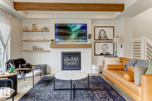 20484 128 Avenue, Edmonton, AB - Indoor Photo Showing Living Room With Fireplace
