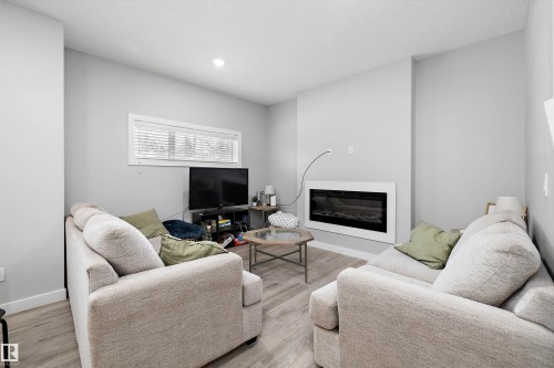 1 7419 106 Street, Edmonton, AB - Indoor Photo Showing Living Room With Fireplace