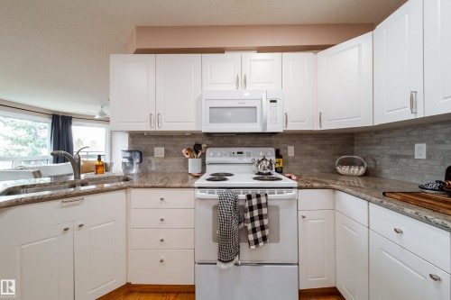 409 7839 96 Street, Edmonton, AB - Indoor Photo Showing Kitchen With Double Sink