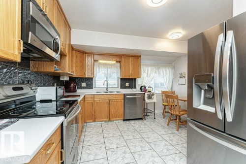 10516 75 Avenue, Edmonton, AB - Indoor Photo Showing Kitchen With Double Sink