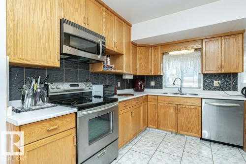 10516 75 Avenue, Edmonton, AB - Indoor Photo Showing Kitchen With Double Sink