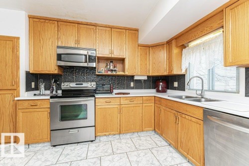 10516 75 Avenue, Edmonton, AB - Indoor Photo Showing Kitchen With Double Sink
