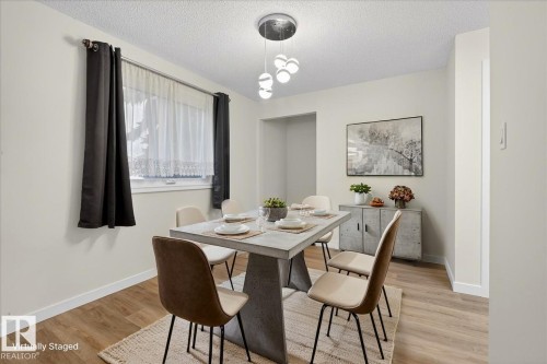 Potential for upper laundry in back closet - 4302 52 Street, Leduc, AB - Indoor Photo Showing Dining Room