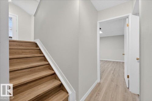 Primary Basement Stairs - 4302 52 Street, Leduc, AB - Indoor Photo Showing Other Room