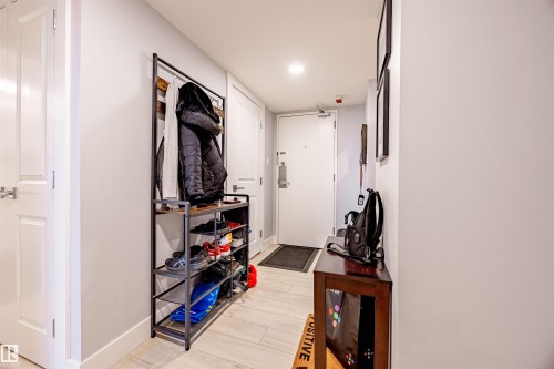 Foyer with light-colored flooring, white walls, and recessed lighting - 803 12303 Jasper Avenue, Edmonton, AB - Indoor Photo Showing Other Room