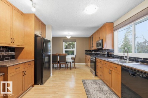 4312 37 Avenue, Leduc, AB - Indoor Photo Showing Kitchen With Double Sink