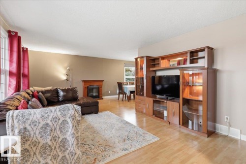 4312 37 Avenue, Leduc, AB - Indoor Photo Showing Living Room With Fireplace