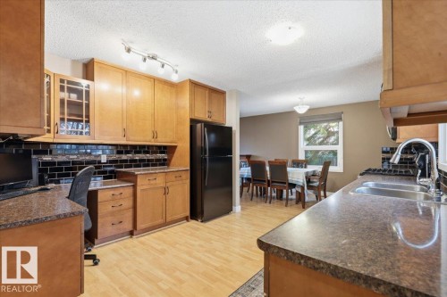 4312 37 Avenue, Leduc, AB - Indoor Photo Showing Kitchen With Double Sink