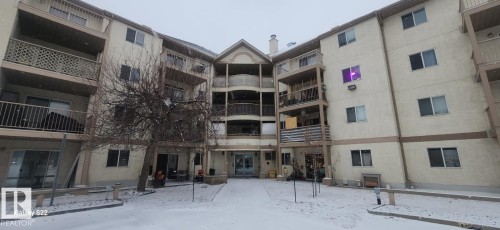 The property features a multi-story building with exterior balconies and patios, offering outdoor living spaces - 204 11218 80 Street, Edmonton, AB - Outdoor With Balcony With Facade