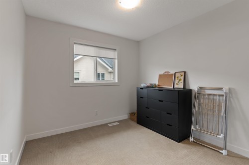 3 5134 Mullen Road, Edmonton, AB - Indoor Photo Showing Bedroom