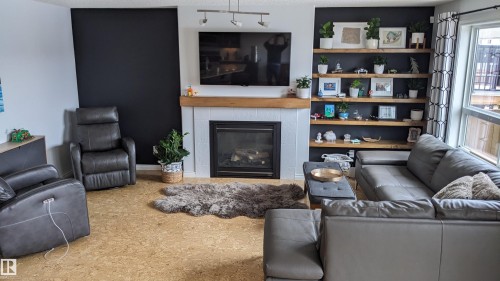 5112 159 Avenue, Edmonton, AB - Indoor Photo Showing Living Room With Fireplace