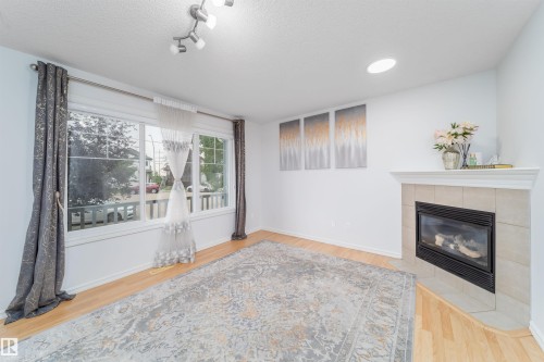 15920 38 Street, Edmonton, AB - Indoor Photo Showing Living Room With Fireplace