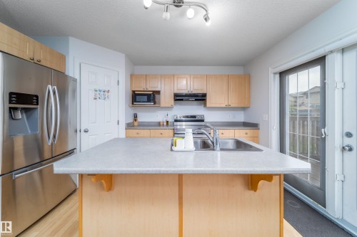 15920 38 Street, Edmonton, AB - Indoor Photo Showing Kitchen With Double Sink