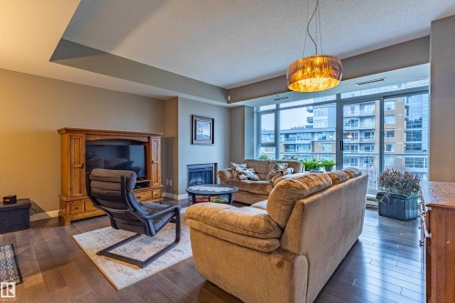 310 2510 109 Street, Edmonton, AB - Indoor Photo Showing Living Room With Fireplace