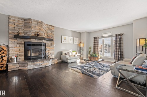 2011 7 Avenue, Cold Lake, AB - Indoor Photo Showing Living Room With Fireplace