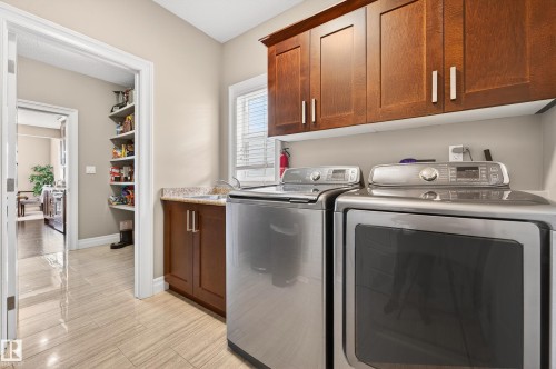 5204 Rue Eaglemont, Beaumont, AB - Indoor Photo Showing Laundry Room