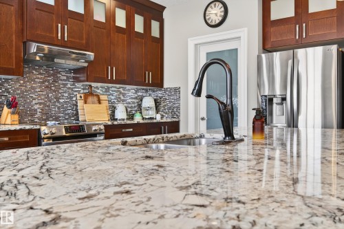 5204 Rue Eaglemont, Beaumont, AB - Indoor Photo Showing Kitchen With Double Sink